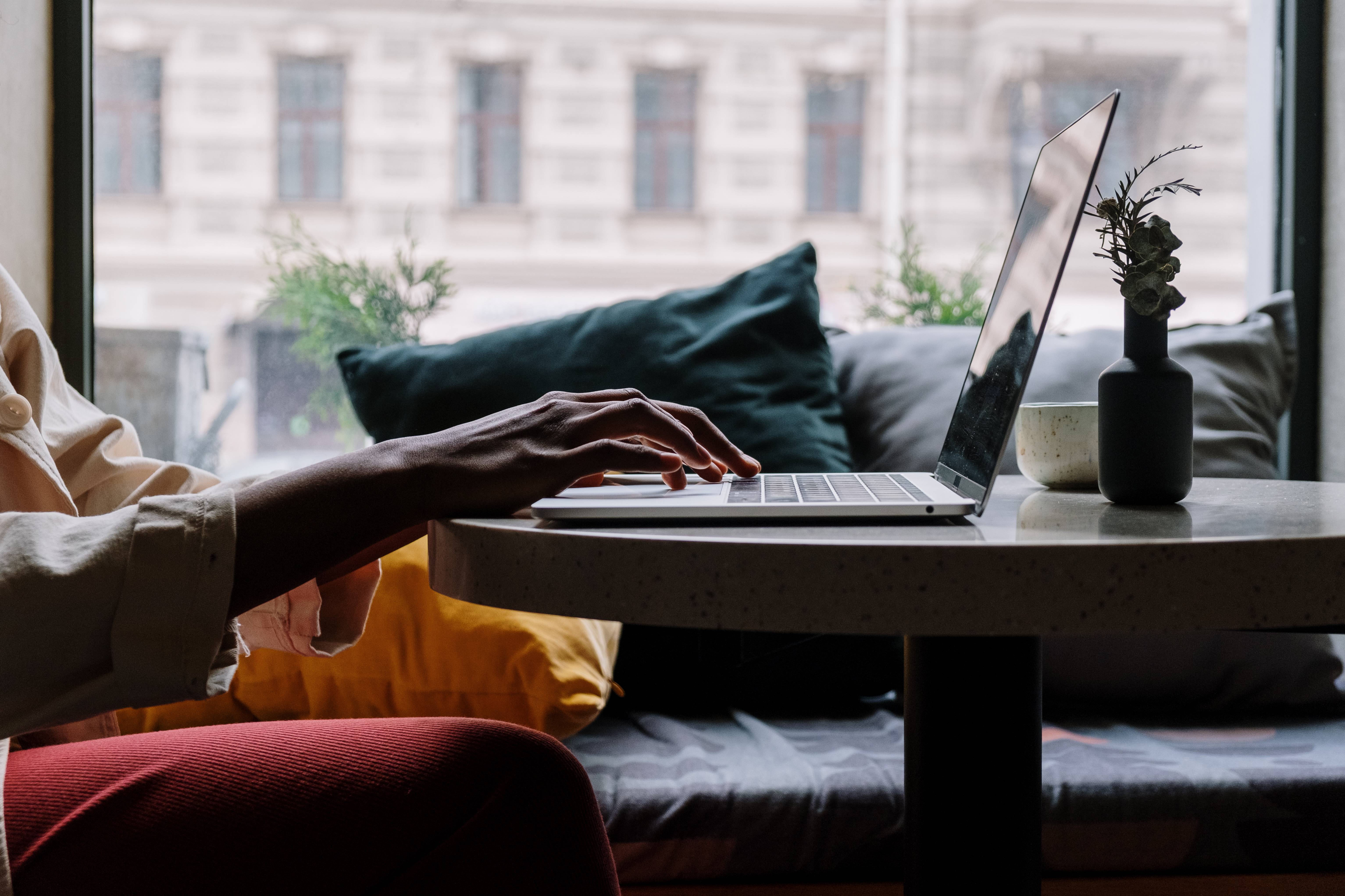 Person typing on a laptop